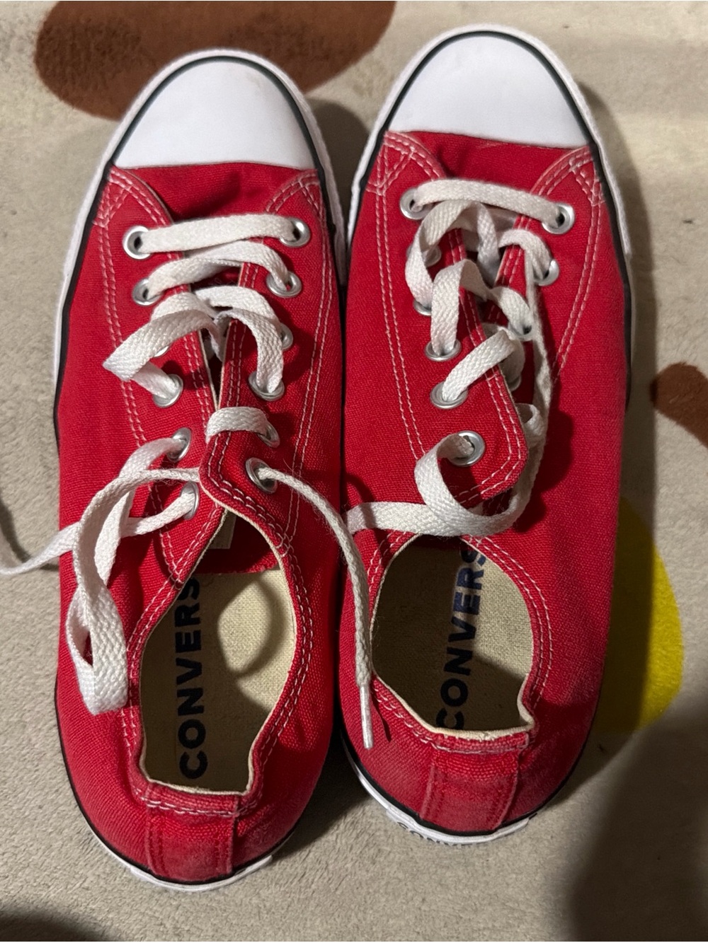 Red low top all star converse shoes